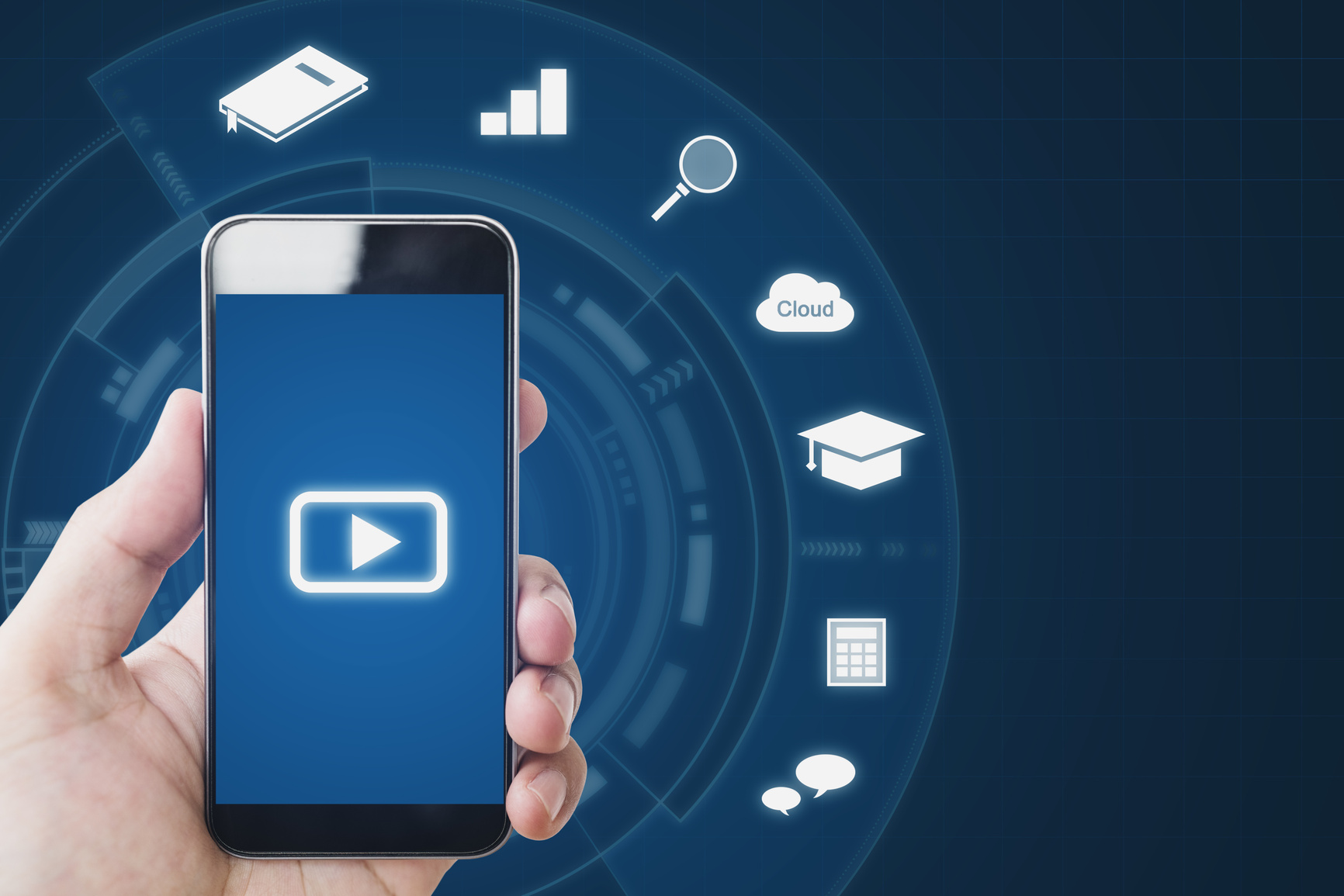 Online media on mobile phone devices, Hand holding mobile smart phone and online media application icons. Online media and application technology concept